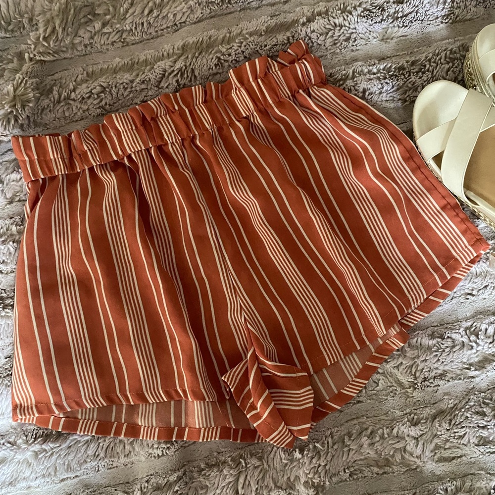 Pink striped beach shorts size Medium